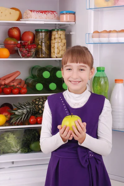 Beautiful  girl near the Fridge with healthy food. — Stock Photo, Image