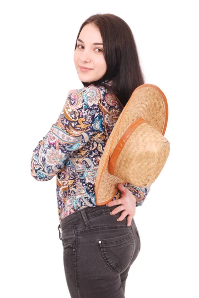 Csinos, fiatal nő visel egy nagy floppy szalma kalapról — Stock Fotó
