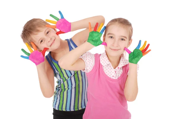 Красивый маленький мальчик и девочка с руками в краске — стоковое фото