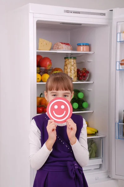 Beautiful  girl near the Fridge with healthy food. — Stock Photo, Image