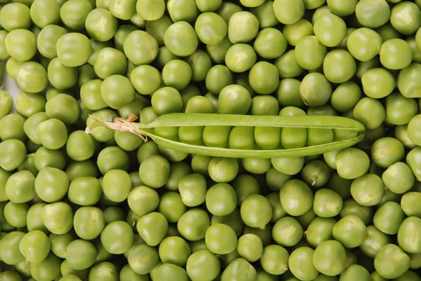 Zöld borsó háttér textúra zöldség — Stock Fotó