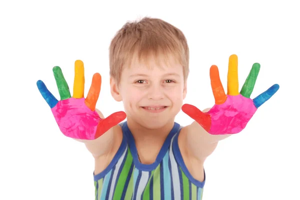 Schöner kleiner Junge mit Händen in der Farbe — Stockfoto