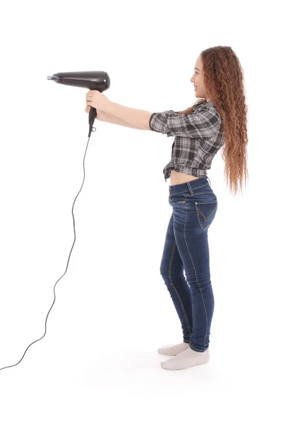 Saç kurutma makinesi ile genç kız — Stok fotoğraf