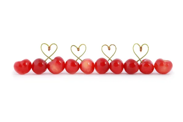 Pair of sweet cherry fruits with heart shaped stem — Stock Photo, Image