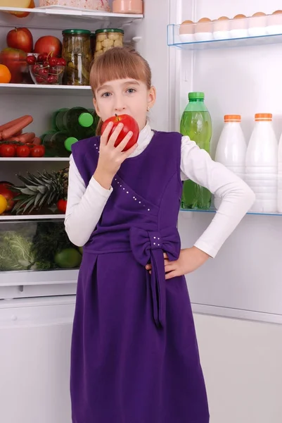 Beautiful  girl near the Fridge with healthy food. — Stock Photo, Image