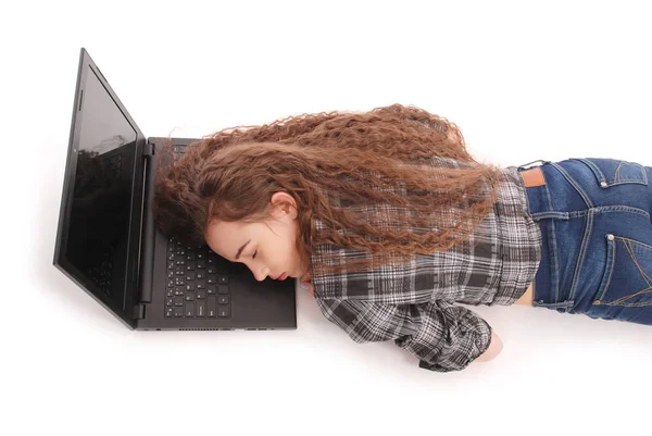 Young girl sleeps on laptop — Stock Photo, Image