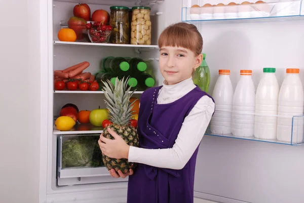 Beautiful  girl near the Fridge with healthy food. — Stock Photo, Image