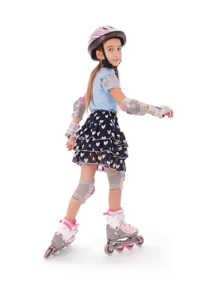 Little pretty girl on roller skates — Stock Photo, Image