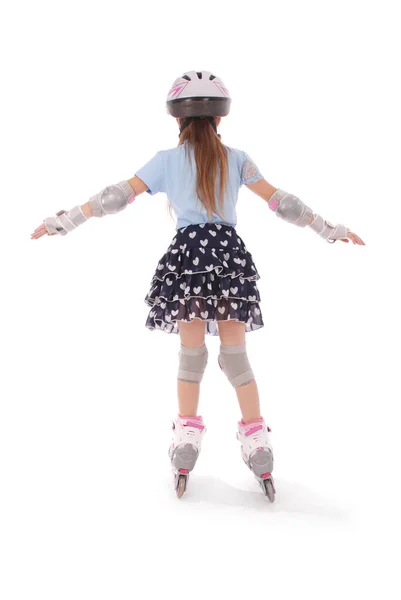 Little pretty girl on roller skates — Stock Photo, Image