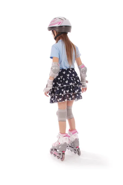 Little pretty girl on roller skates — Stock Photo, Image