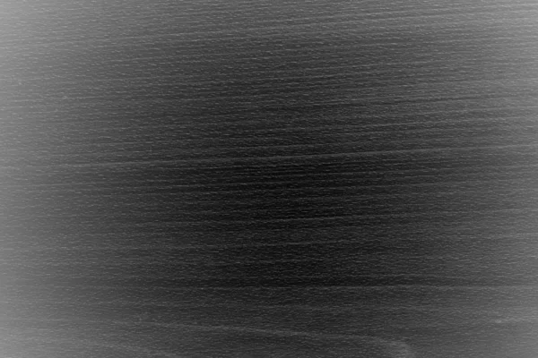 Black wooden background or gloomy wood grain texture, abstract wooden background.