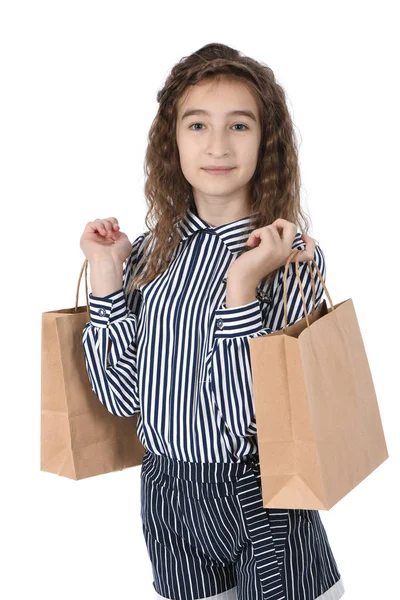 Niño con un paquete aislado en blanco — Foto de Stock