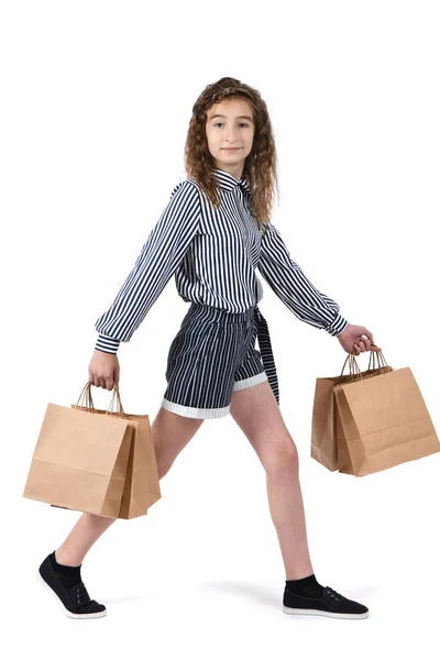 Child with a packet isolated on white — Stock Photo, Image