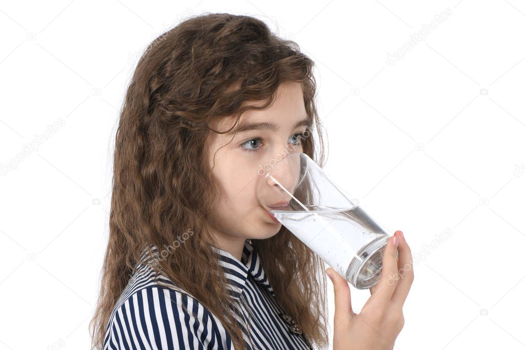 Portrait of a girl drinking mineral water