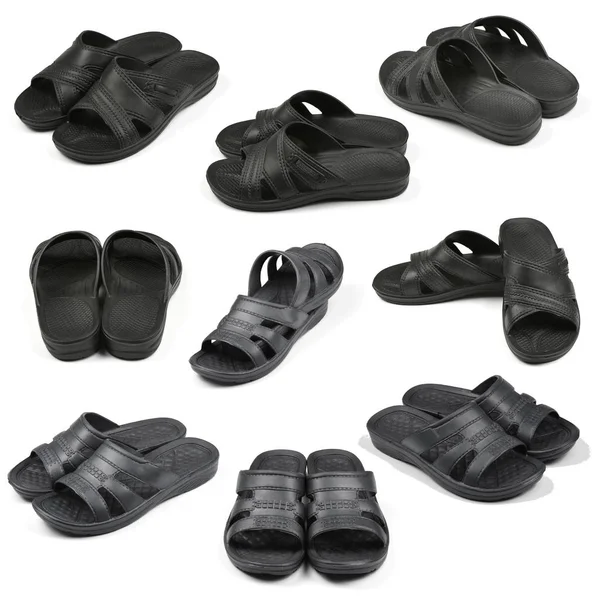 Nine pair of black flip flops — ストック写真