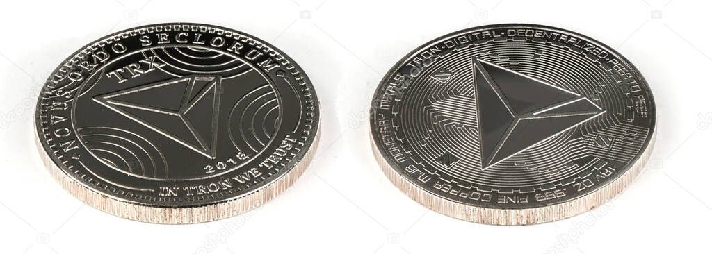 Face and back side of the crypto currency silver tron isolated on white background. High resolution photo. Full depth of field.