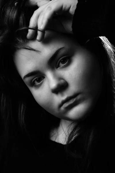 young fatty woman looking at camera. close up portrait