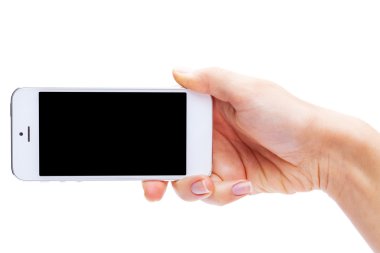 El ele tutuşan akıllı telefon.