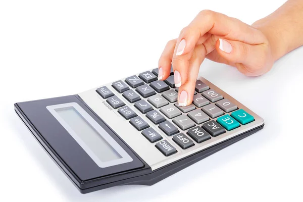 Una calcolatrice in una mano è isolata su uno sfondo bianco — Foto Stock