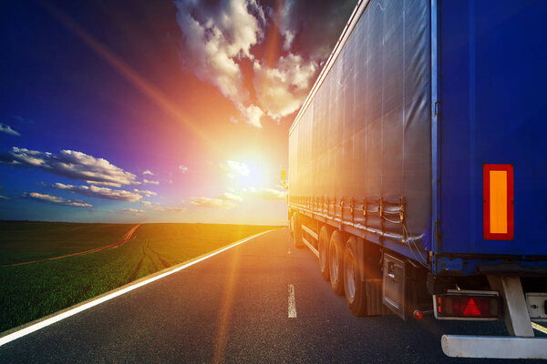 truck  driving   on a highway