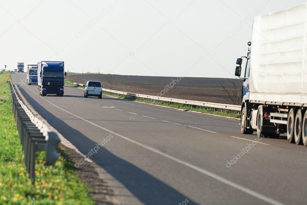 truck  driving   on a highway