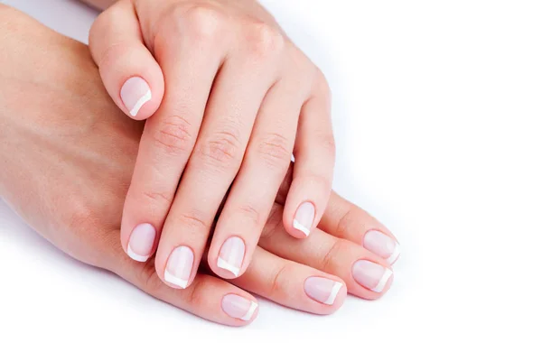 Mãos de mulher com manicure francês — Fotografia de Stock