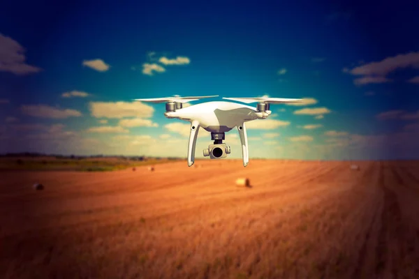 Drone in the field on summer day — Stock Photo, Image