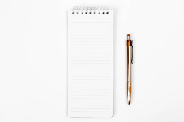 the white open notepad and computer keypad isolated on the white background