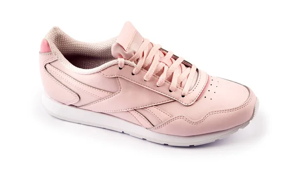 Rosa Sportschuhe isoliert auf weißem Hintergrund. weibliche rosa Schuhe — Stockfoto