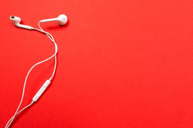 headphones isolated on red background