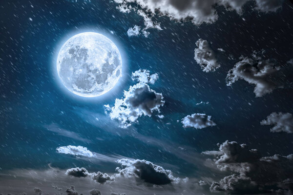 Backgrounds night sky with stars and moon and clouds.