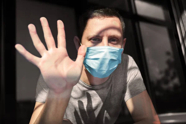 Man Quarantine Because Virus Sits Home Mask Looks Out Window — Stock Photo, Image