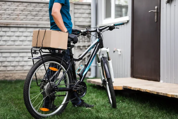 pandemic home delivery of food by bicycle. social distancing for infection risk