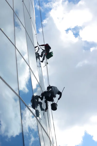 Glass wall cleaning.