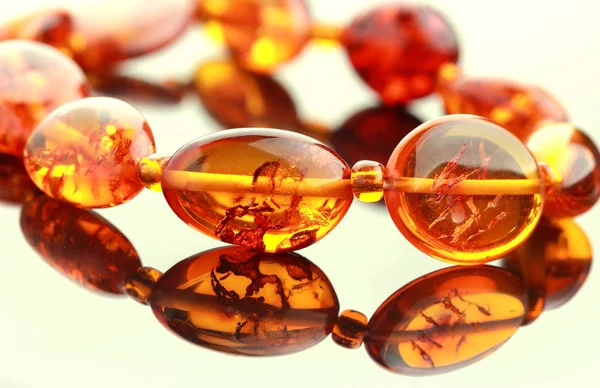 Bracelet of pieces of brown amber — Stock Photo, Image
