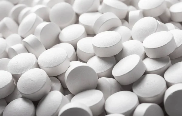 White pills close up — Stock Photo, Image