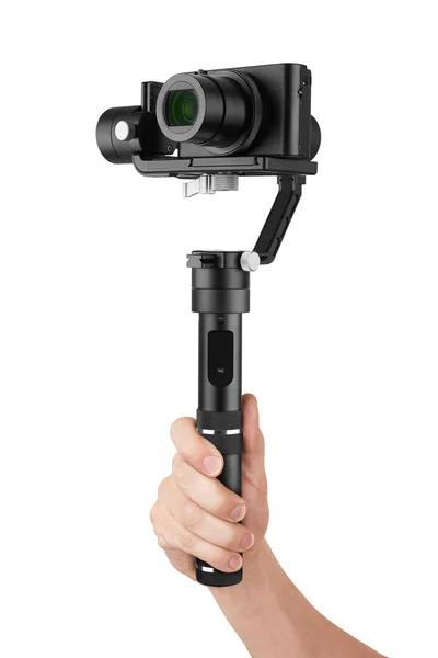 Digital camera with gimbal in hand — Stock Photo, Image