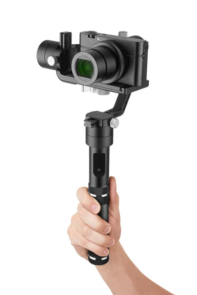 Digital camera with gimbal in hand — Stock Photo, Image