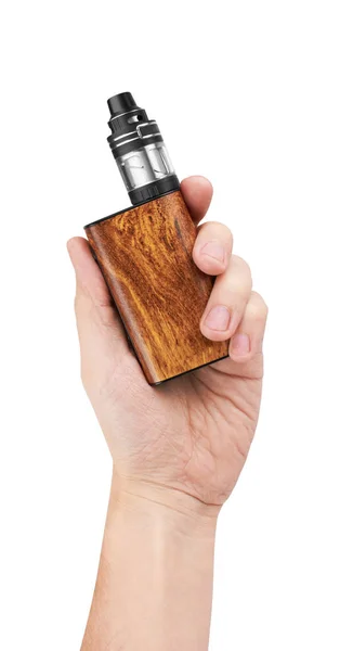Электронная сигарета или Vaping устройство в руке — стоковое фото