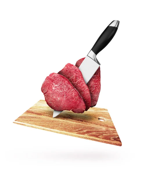 Pieces of raw beef steaks with knife, over cutting board — Stock Photo, Image