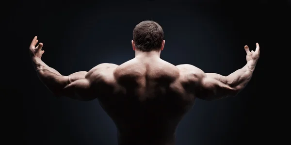 Close up of sports mans muscular back isolated — Stock Photo, Image