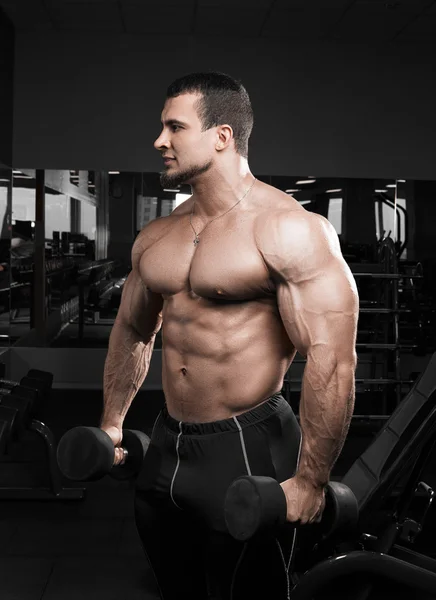 Muscular athletic bodybuilder — Stock Photo, Image