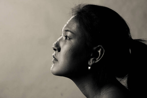 silhouette of female face with some detail still visible