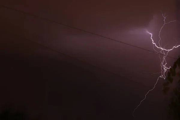 Foto abstrata Lightning in the night city. Desfoque de movimento . — Fotografia de Stock