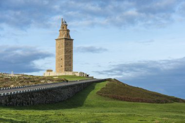 Tower of Hercules, the almost 1900 years old and rehabilitated in 1791 55 metres tall structure is the oldest Roman lighthouse in use today and overlooks the Atlantic coast of Spain from A Coruna. clipart