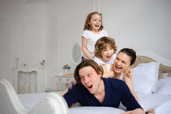 Morning of the day off in a happy family. — Stock Photo, Image