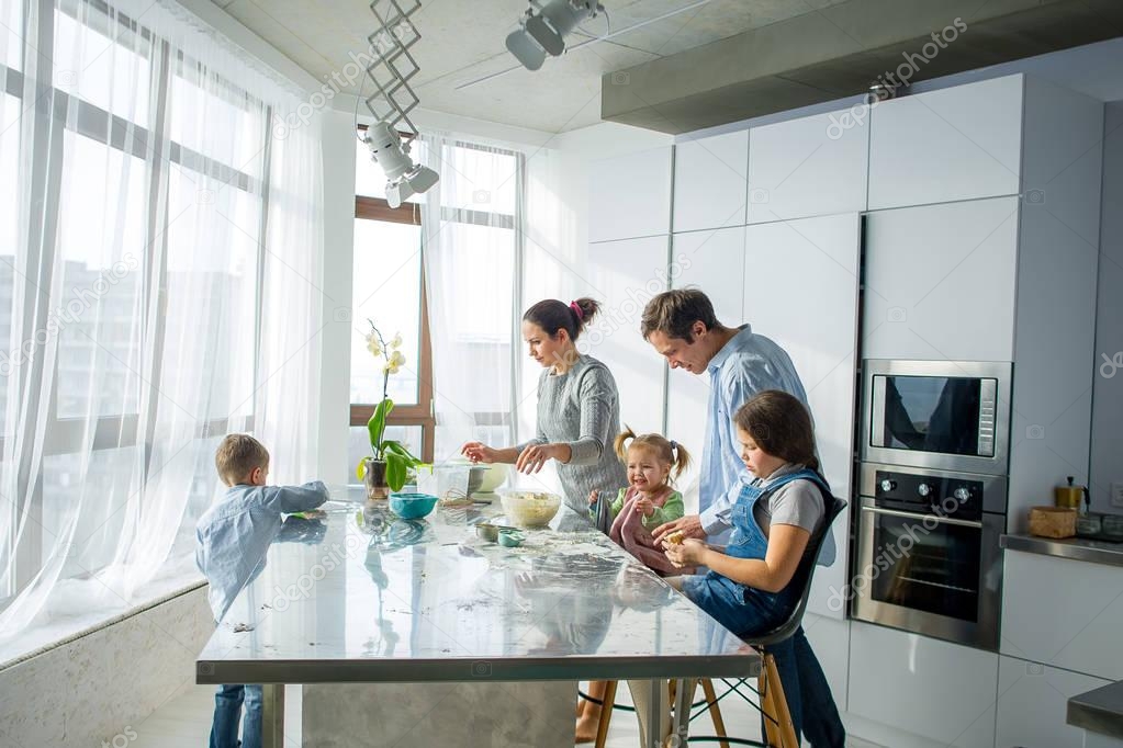 A family of five in the kitchen