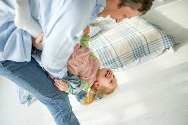 Father Plays Little Daughter Child Laughs Pleasure — Stock Photo, Image