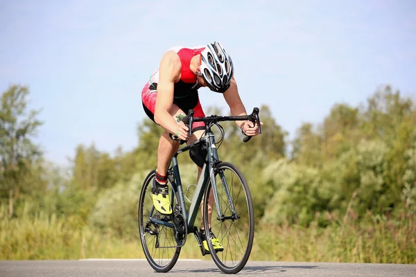 Triathlete Overcomes Cycling Stage Stock Image
