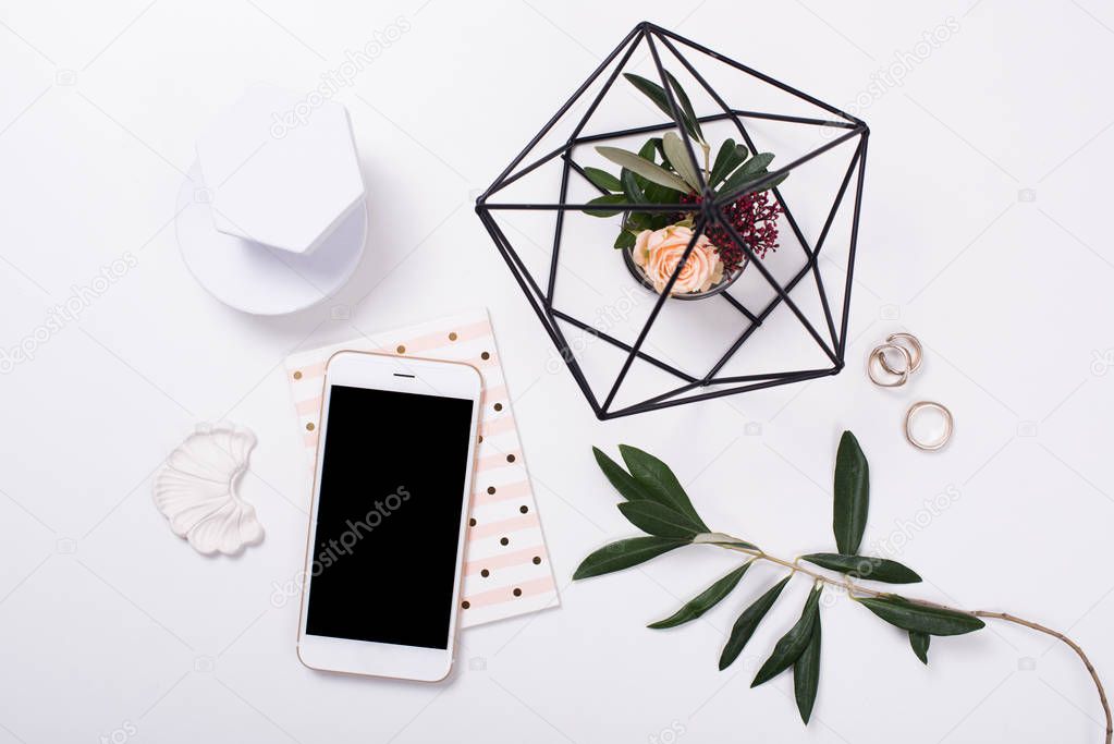 feminine tabletop flatlay with smartphone mock-up
